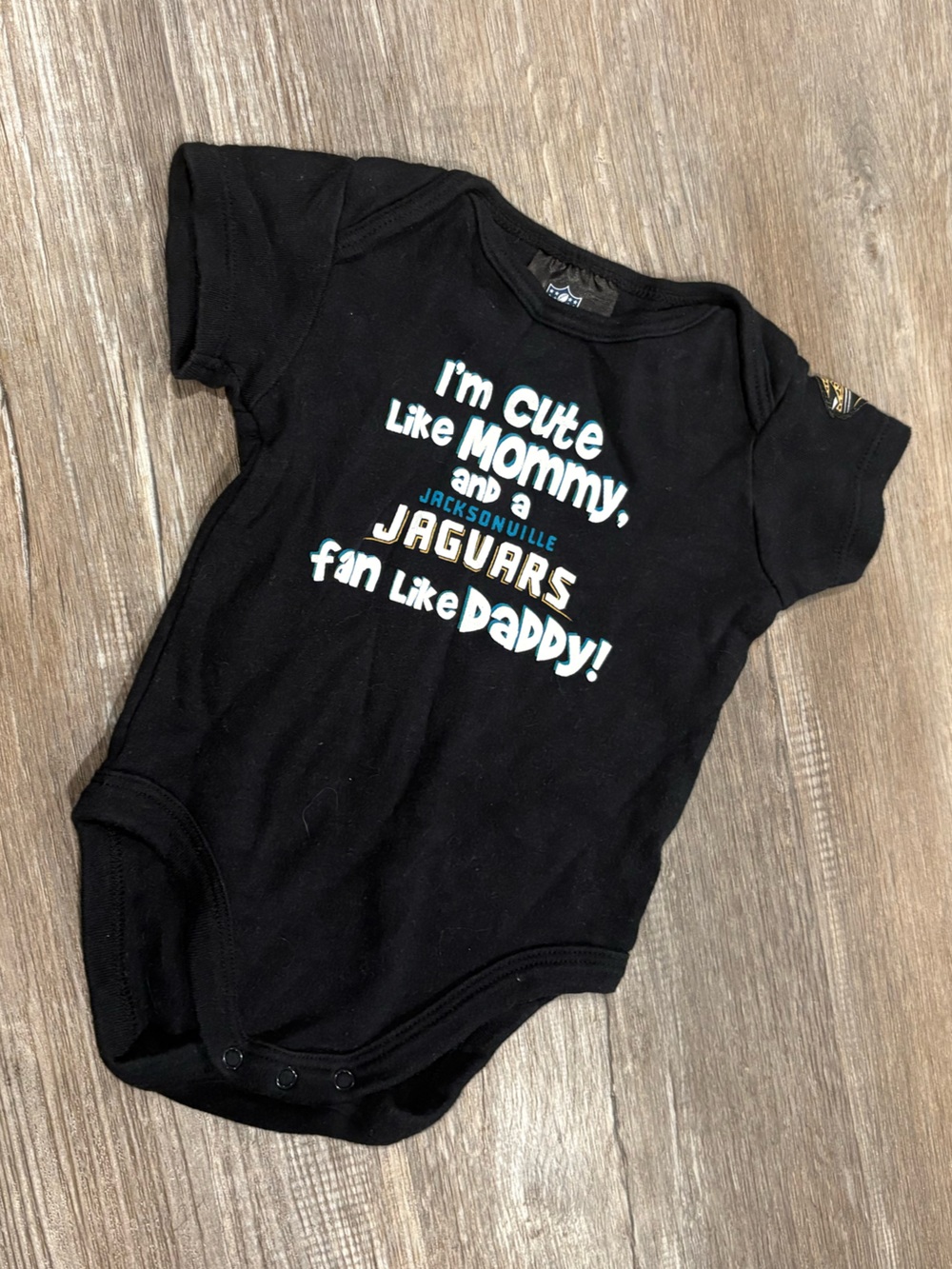 NFL Black Jacksonville Jaguars Graphic Baby Bodysuit